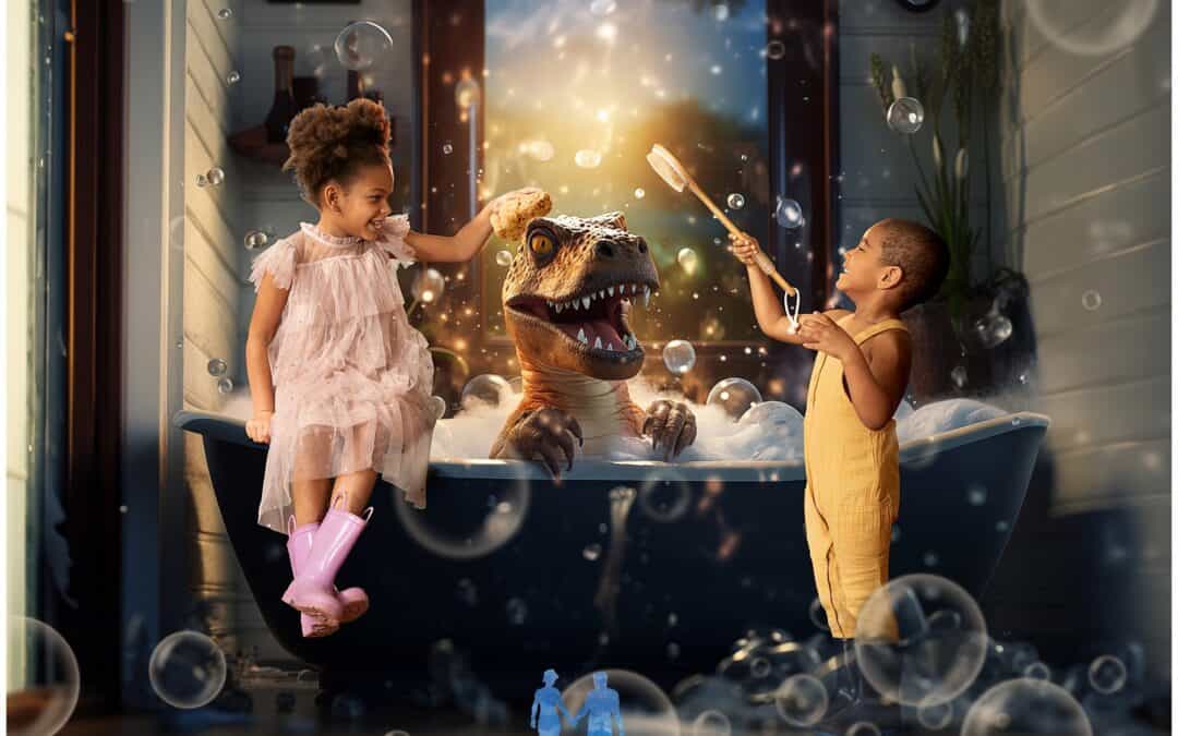 Two children joyfully give a toy T-Rex a bubble bath; one scrubs its head, and the other holds a brush. Bubbles float around them in a cozy, well-lit bathroom.