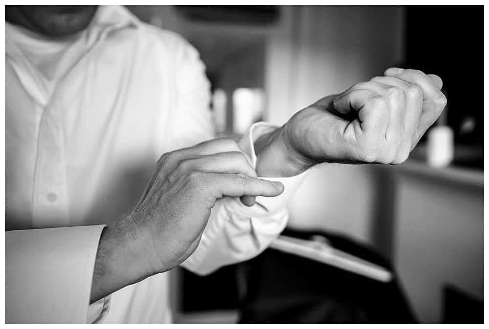 Acadia Wedding Photographers, Bar Harbor Wedding Photographers, groom buttons his shirt