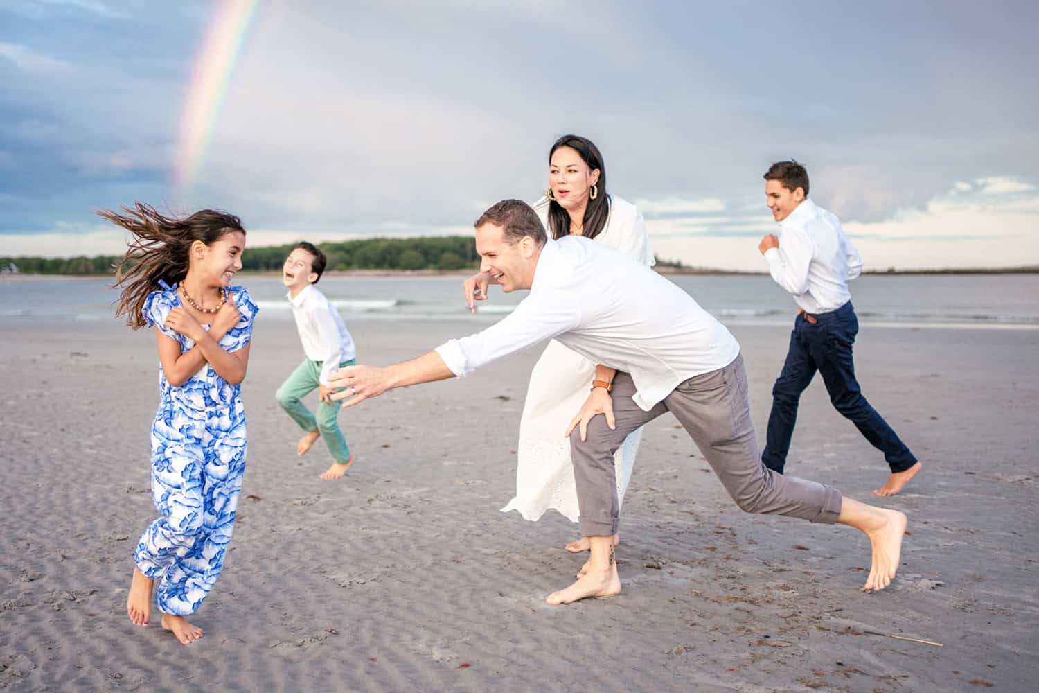 Family plays on Goose Rocks Beach for their Kennebunkport Family Portraits