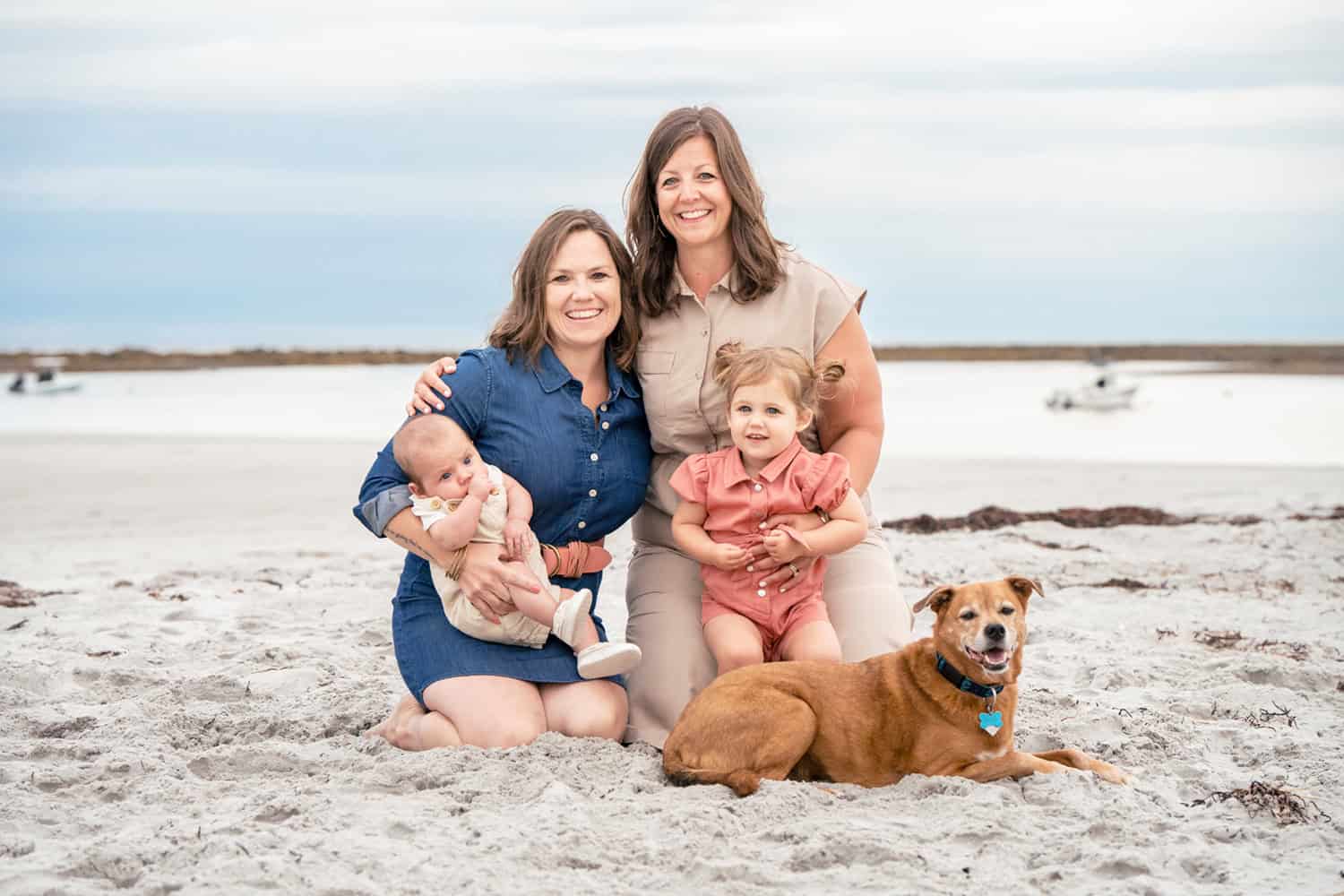 same sex family poses on Goose Rocks Beach in Kennebunkport Maine