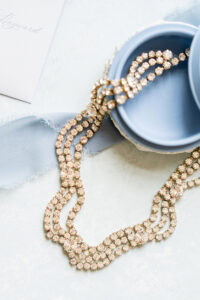 Blue wedding details with a vintage diamond necklace for a Newport Mansion Wedding