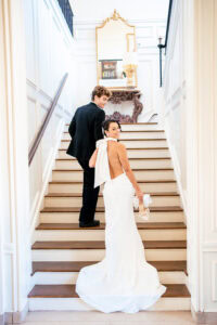 Bride and groom on the stairs for a Newport Mansion Wedding