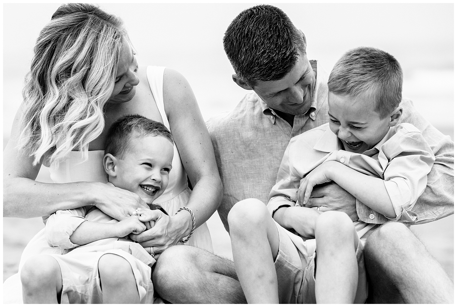 Family dressed in blues and whites for their Wells Beach Family Portraits captured by Wells Beach Family Photographer