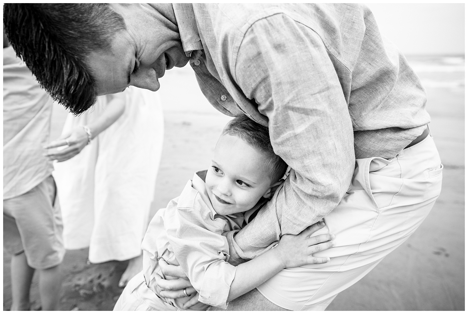 Family dressed in blues and whites for their Wells Beach Family Portraits captured by Wells Beach Family Photographer