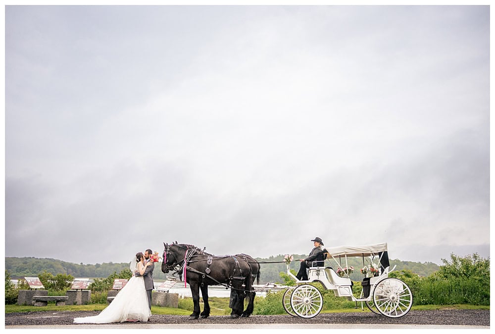 1774 Inn Wedding in Phippsburg, Maine. Horse drawn carriage by the river.