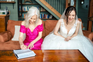 1774 Inn Wedding Photographer captures the signing of the marriage license