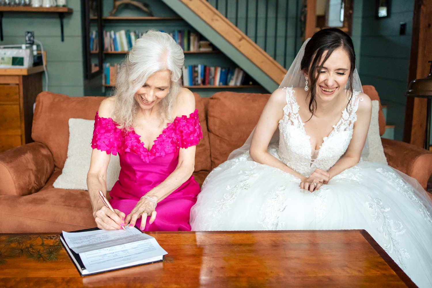 1774 Inn Wedding Photographer captures the signing of the marriage license