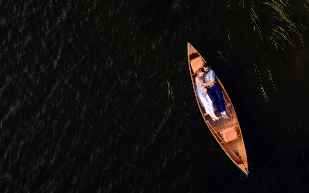 Maine Lake Engagement Session, Romantic Lake Portraits, Drone Photographer in Maine, Engagement Session on a boat