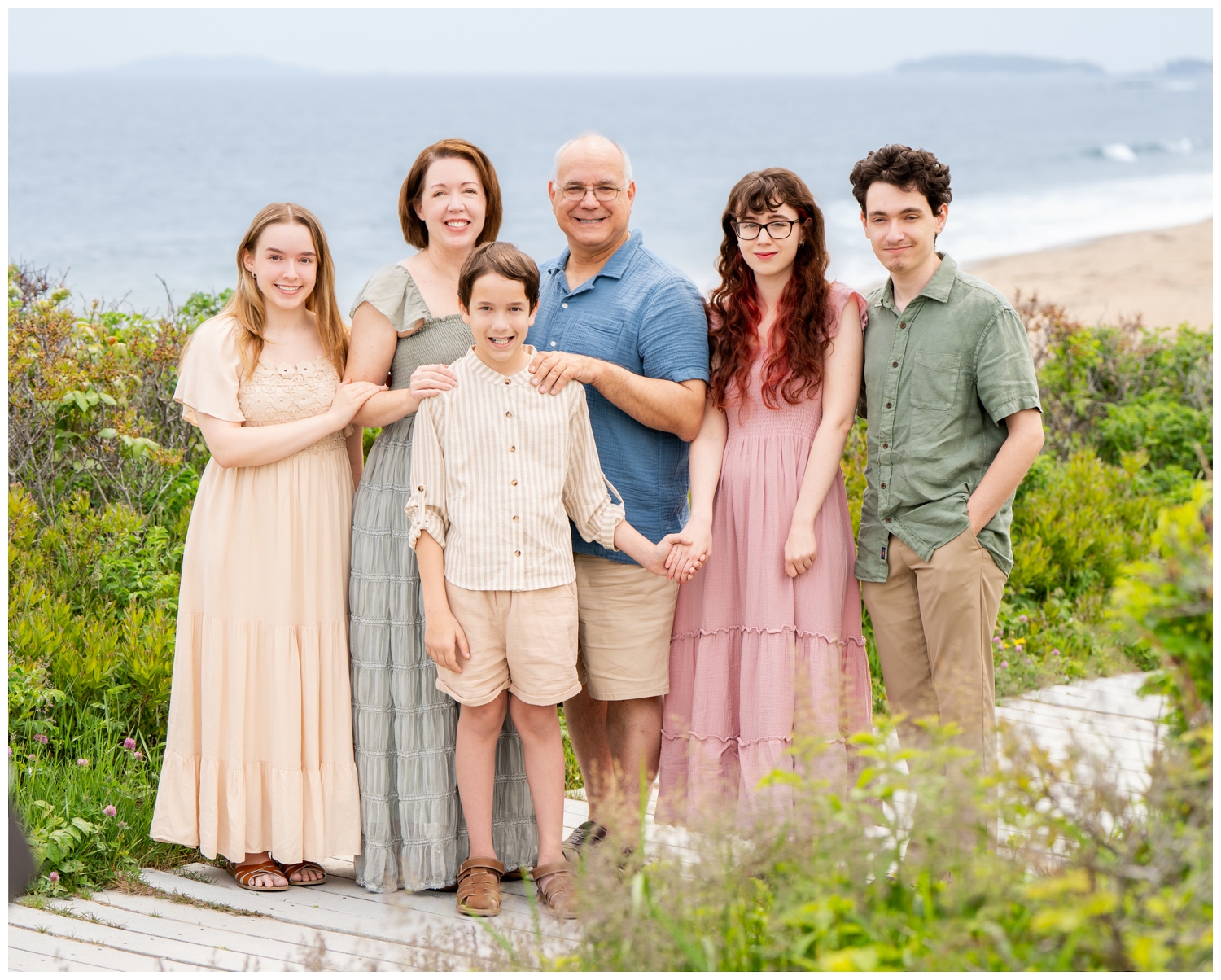 Reid State Park Family PHotographers, Tow Adventurous Souls captured a family on the beach in the park and on the rocky cliffs