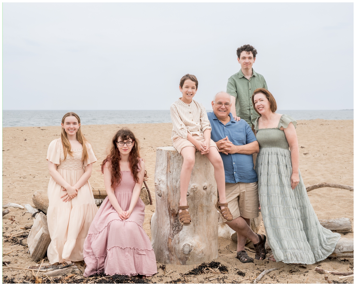 Reid State Park Family PHotographers, Tow Adventurous Souls captured a family on the beach in the park and on the rocky cliffs